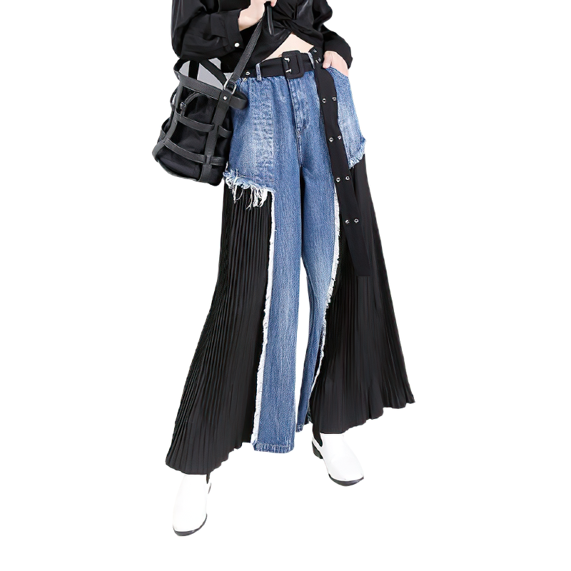 Stylish high waist blue denim trousers with pleated black sides, perfect for a trendy, alternative fashion look.