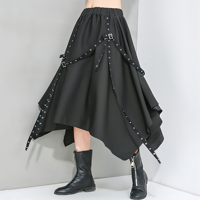 High waist black asymmetrical women's skirt with straps and rivets, perfect for alternative and gothic fashion styles.