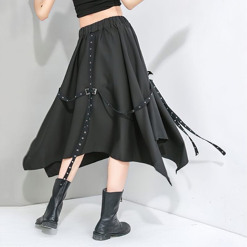 Stylish high waist black skirt with straps and metal rivets, perfect for alternative fashion enthusiasts.