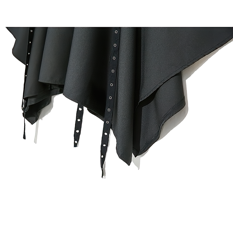 Close-up of high waist black skirt featuring asymmetrical hem, straps, and metal rivets for alternative fashion.