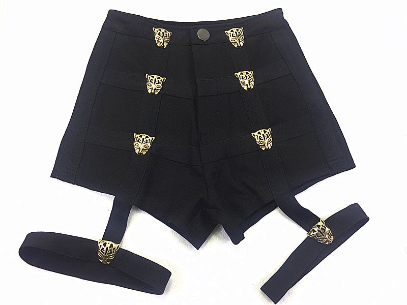 High waist short shorts for women featuring metallic leopard buttons and leg belts, perfect for rave outfits.