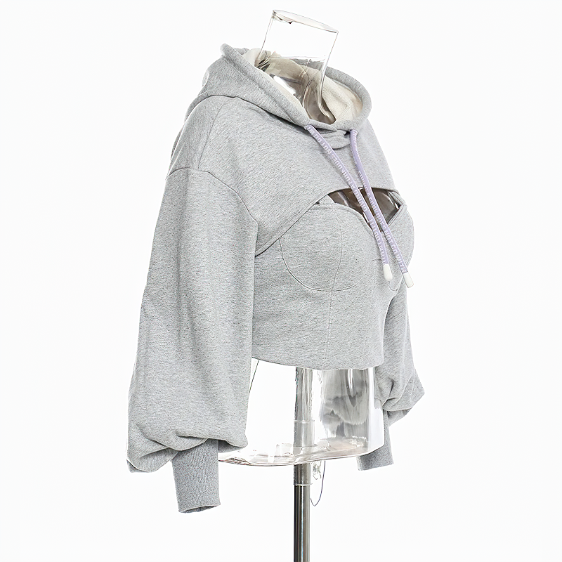 Stylish grey hollow out hooded long sleeve top for women, perfect for alternative streetwear fashion.