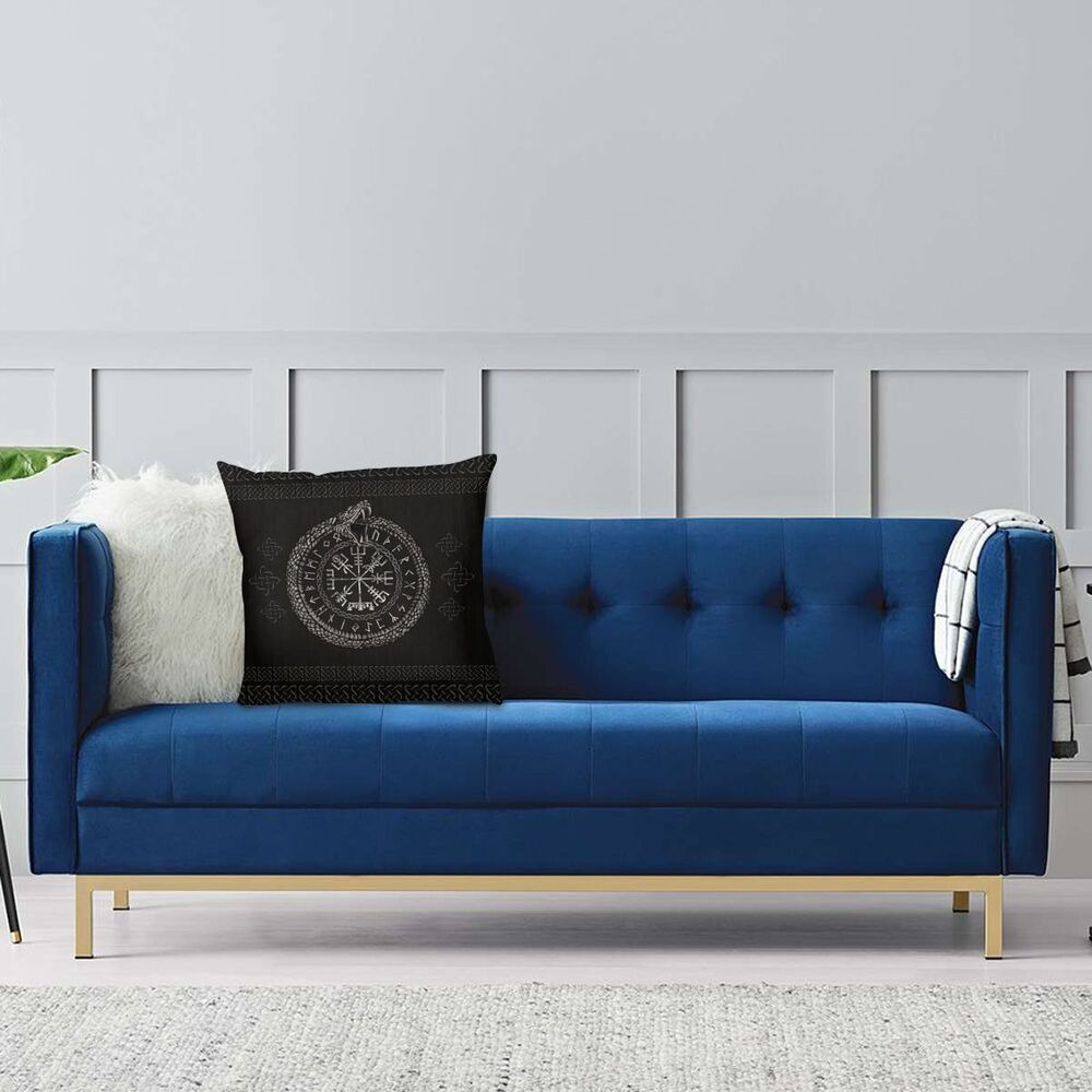 Viking Helm Of Awe pillow on a stylish blue sofa, adding authentic decor to modern living space.