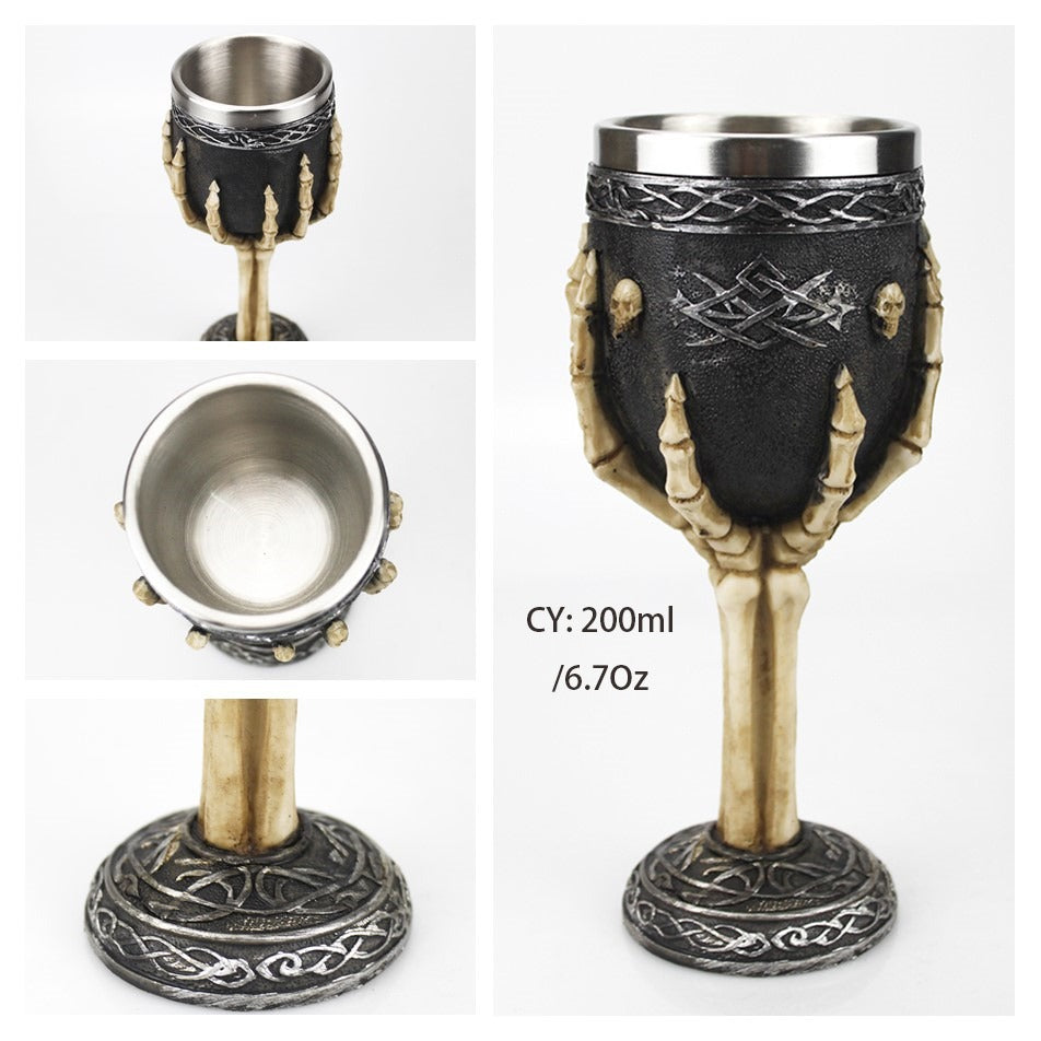 Horrible Sacrifice Vintage Goth Wine Glass with skulls and bone leg detail, stainless steel and resin, perfect for decor.