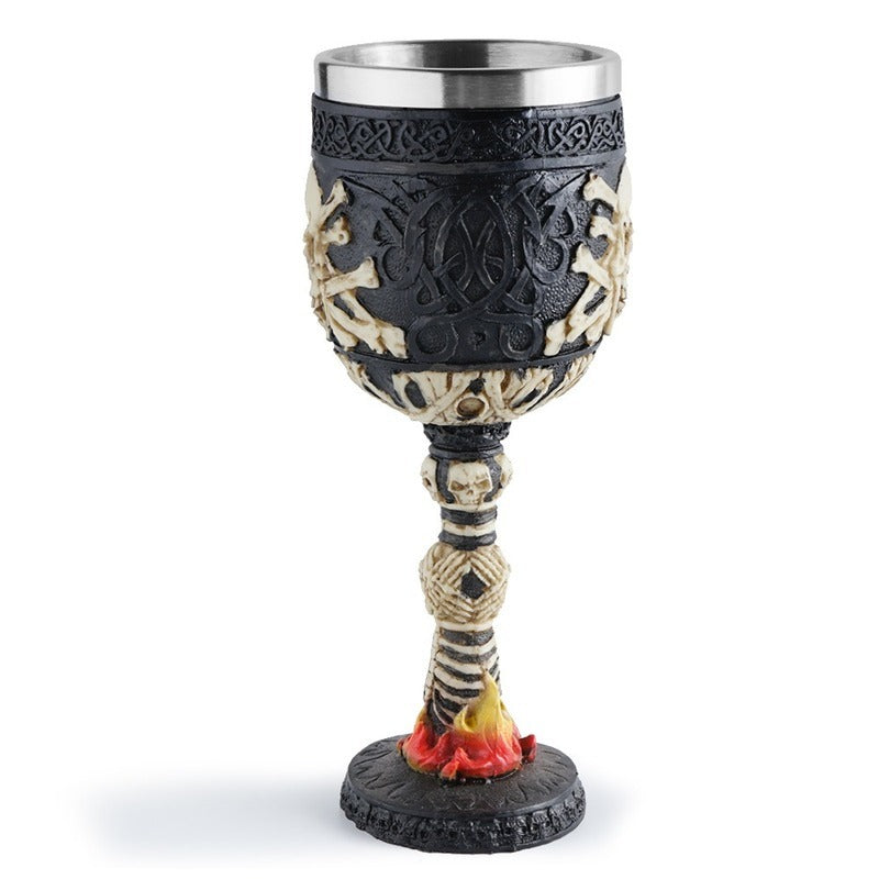 Horrible skull wine glass with stainless steel interior, Gothic design featuring flames, perfect for home decor or gifts.
