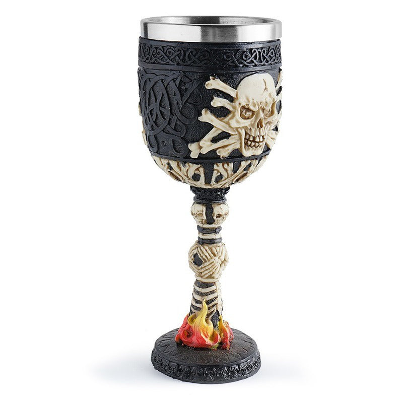 Vintage Gothic skull wine glass with stainless steel, intricate design, and flame details for spooky home decor.