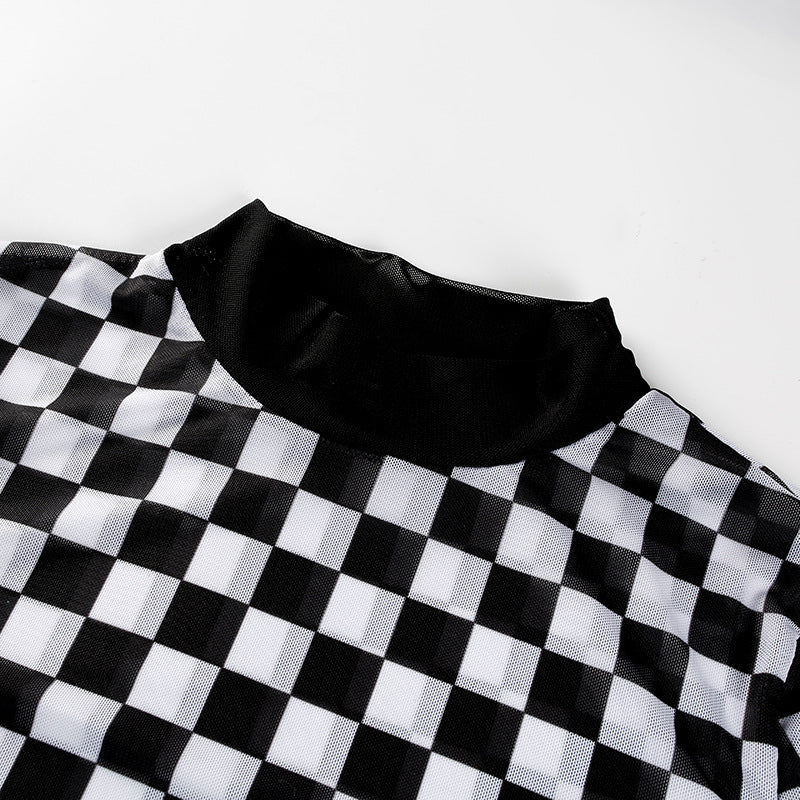 Stylish black and white checkered mesh top with a high neckline, perfect for a grunge-inspired outfit.