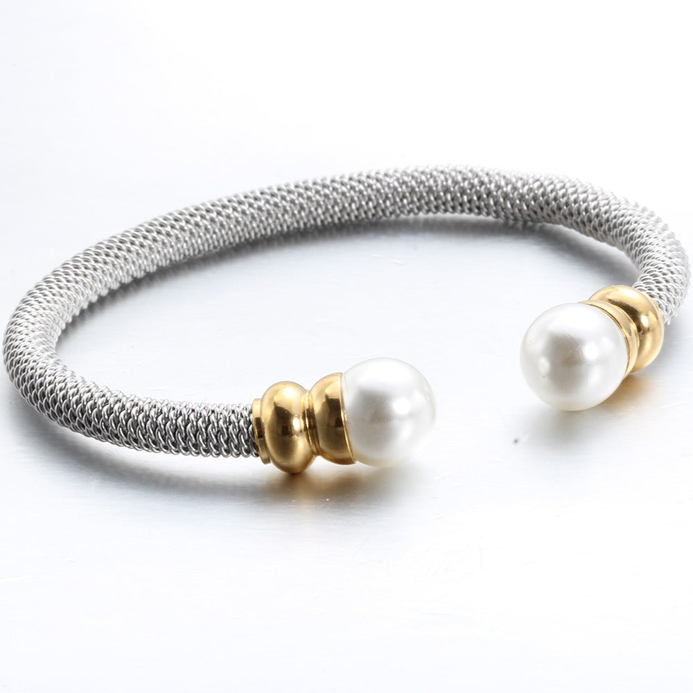 Imitation pearl bracelet for women in luxury stainless steel, featuring gold and silver colors, perfect for trendy fashion looks.