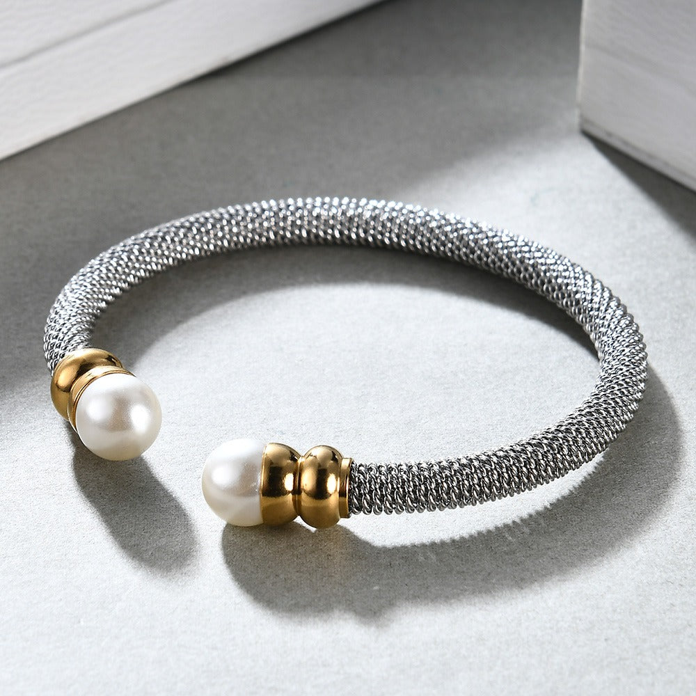 Trendy imitation pearl bracelet for women, stainless steel with gold and silver accents, perfect for any outfit.