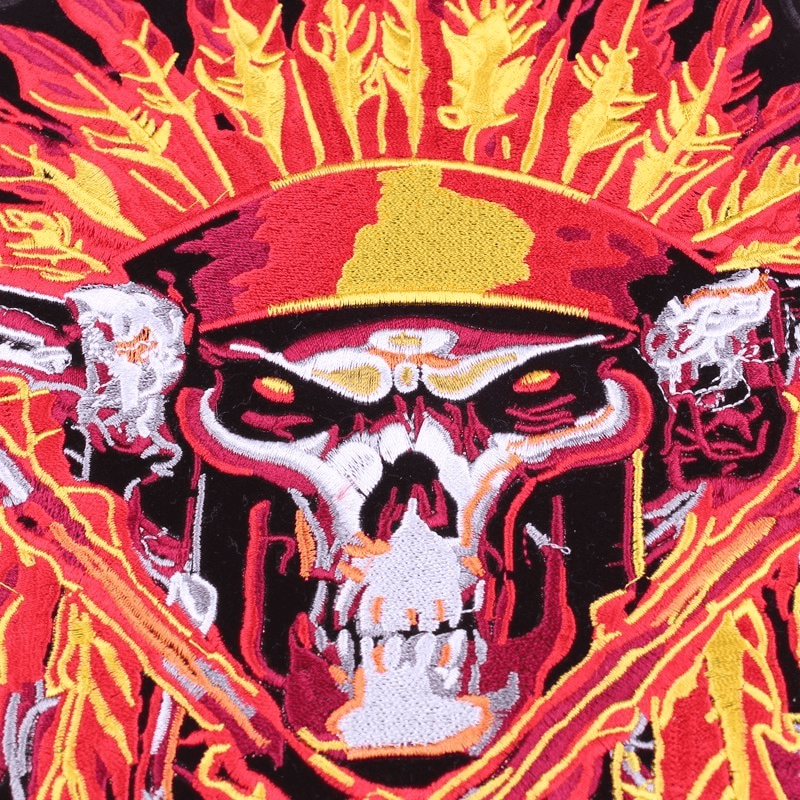 Colorful Indian skull and tomahawks iron-on patch, perfect for biker jackets and fashionable outerwear.