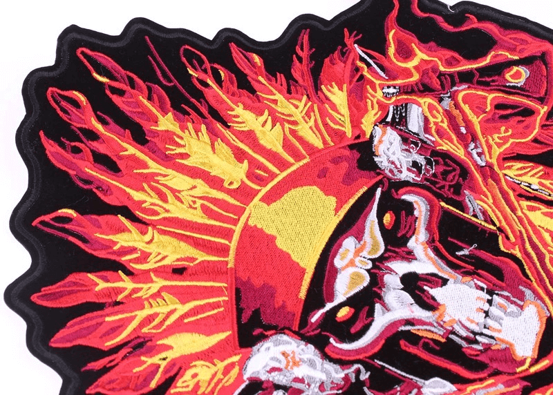 Vibrant Indian skull and tomahawks patch with flames, perfect for biker jackets and stylish outerwear.