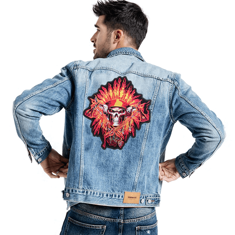 Large embroidered Indian skull patch on denim jacket, perfect for biker style and iron-on customization.