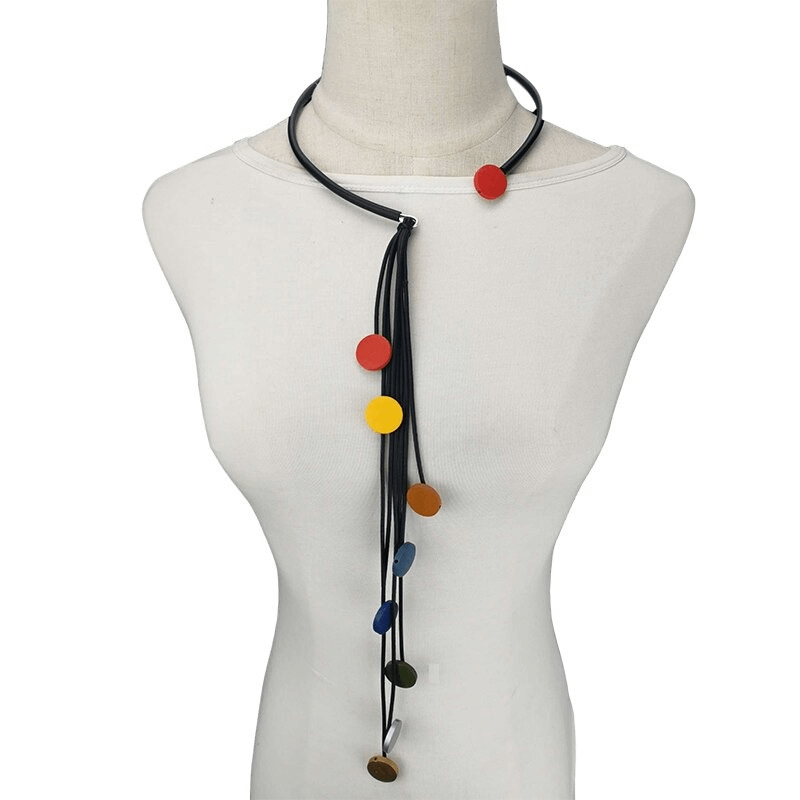 Colorful handmade long tassel rubber necklace for women, featuring unique wooden accents in modern style.