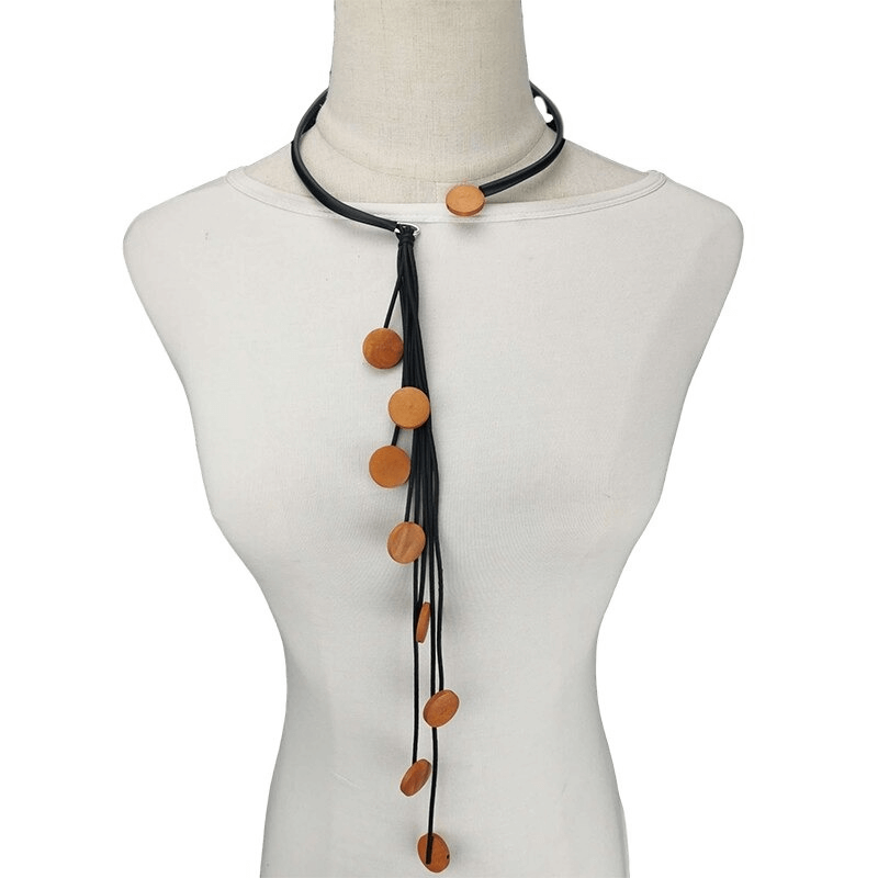 Handmade long tassel rubber necklace with wooden beads for women, perfect original accessory.