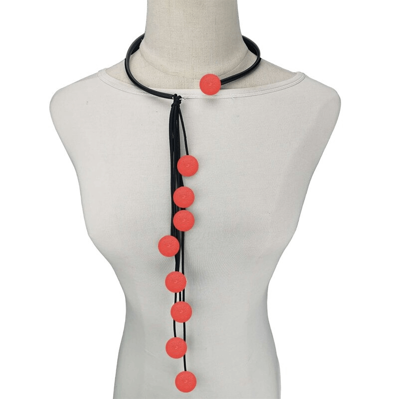 Handmade long tassel rubber necklace with vibrant red beads, perfect original accessory for women's style.