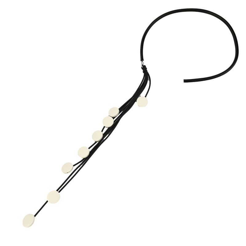 Handmade women's long rubber necklace with tassel and circular accents, stylish accessory for unique fashion.