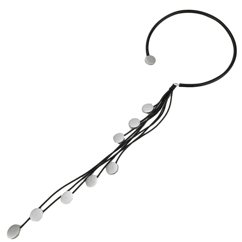 Handmade long rubber necklace with tassel insert and decorative beads for women, stylish original accessory.