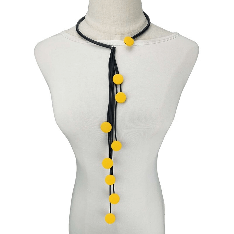 Handmade long tassel rubber necklace with yellow accents, perfect accessory for women.