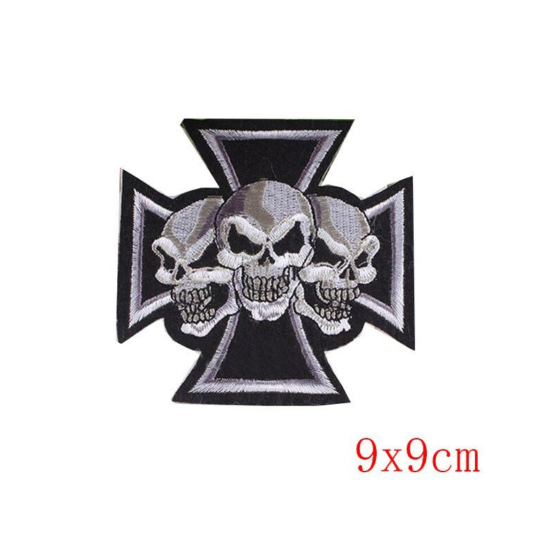 Iron cross patch with three skulls, stylish rocker accessory for jackets and bags, 9x9cm.