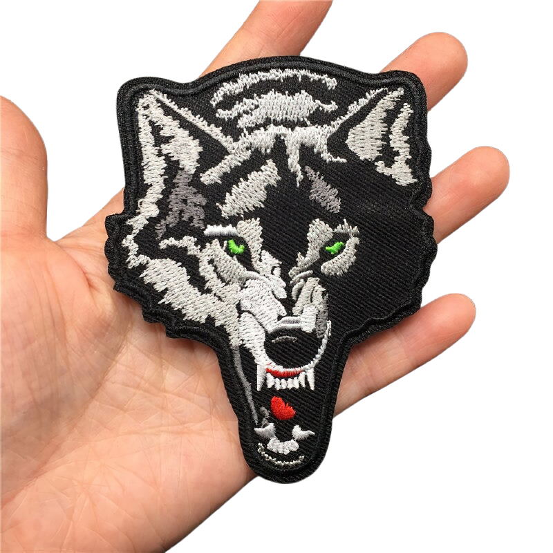 Angry green-eyed wolf patch, rock style embroidery, perfect accessory for clothing.