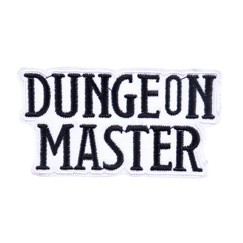 Iron-on patch reading 'Dungeon Master' in bold letters, perfect for adding a stylish touch to clothing.
