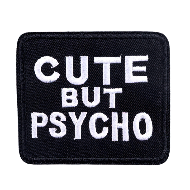 Iron-on patch with the inscription 'Cute But Psycho' for a stylish rock look.
