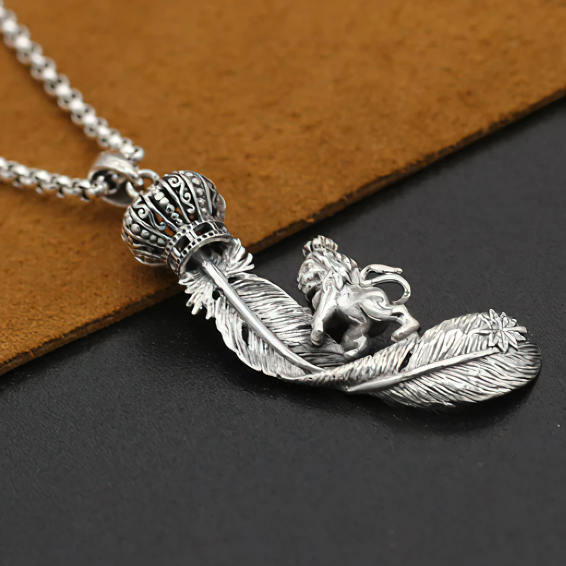 Stylish unisex stainless steel pendant featuring a king lion on a feather, perfect for alternative fashion enthusiasts.