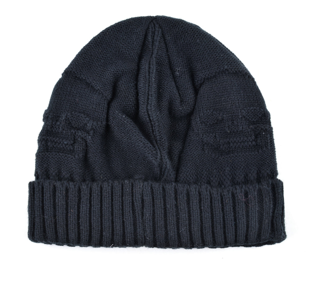 Knitted wool beanie with skull pattern, perfect for alternative winter fashion for men.