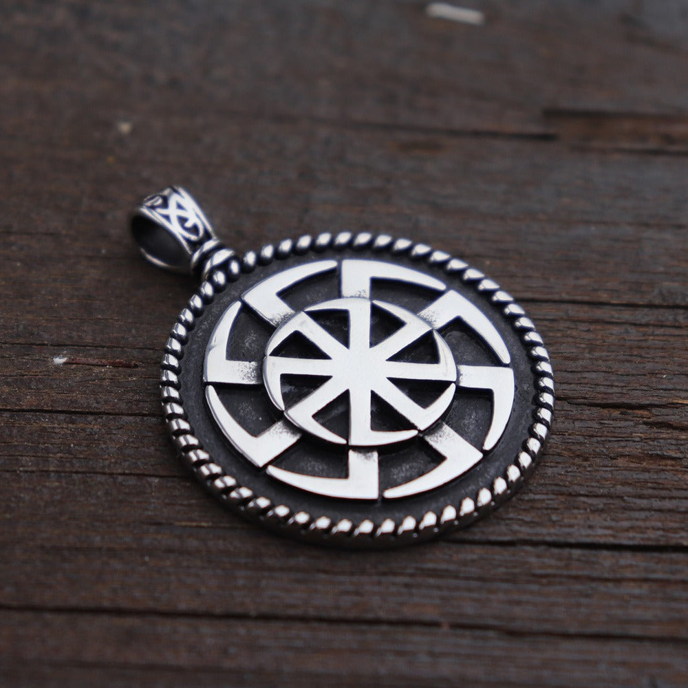 Kolovrat Pagan stainless steel pendant featuring a unique Slavic sun symbol, perfect for vintage jewelry lovers.