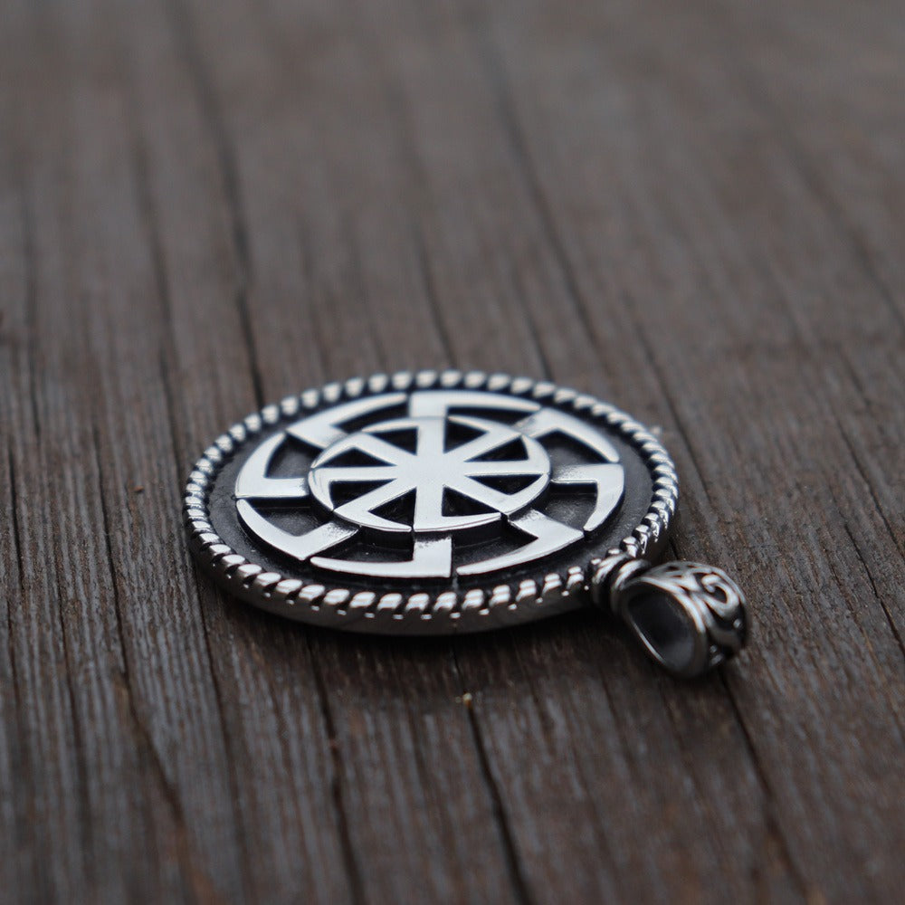 Kolovrat Pagan stainless steel pendant showcasing the Slavic sun symbol, perfect for unique jewelry lovers.
