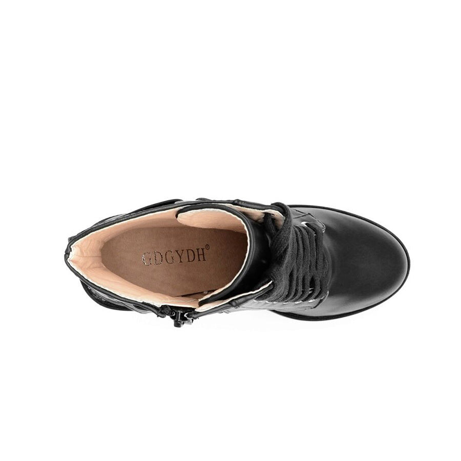 Top view of black lace-up PU leather platform boots for women with decorative straps and zipper closure.