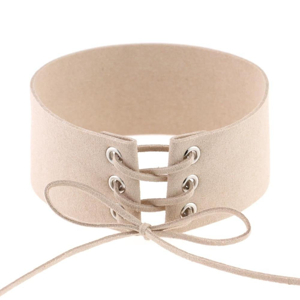 Lace-up beige velvet choker necklace with metal eyelets and tie closure, a trendy accessory for any outfit.