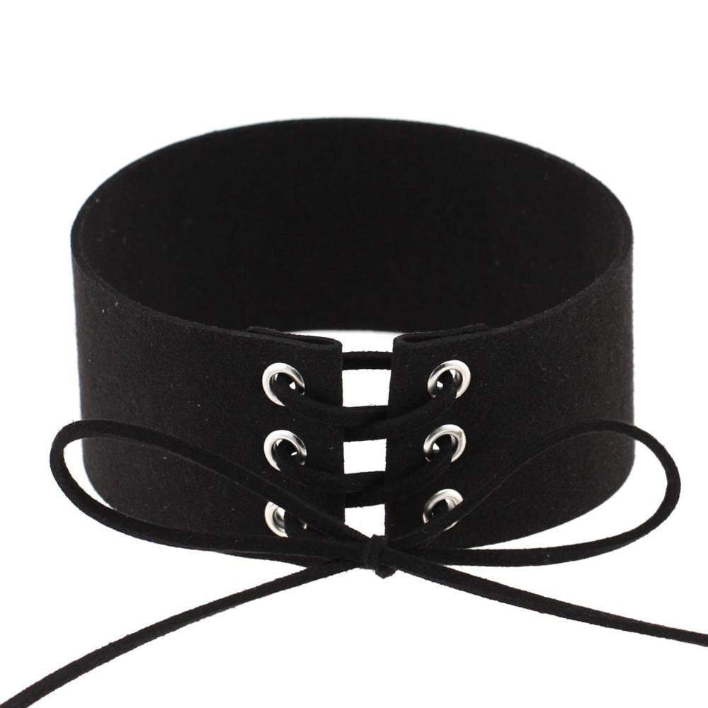 Black lace-up velvet choker necklace with chunky design and silver eyelets, perfect goth accessory.