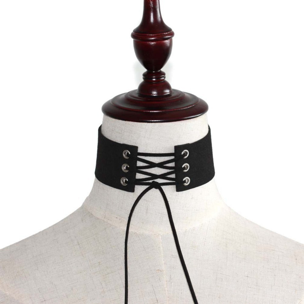 Black lace-up velvet choker displayed on a mannequin, showcasing its chunky gothic style and trendy design.