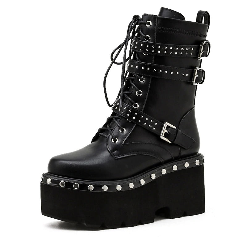 Gothic style ladies ankle boots with chunky platform, round toe, and decorative buckle straps.