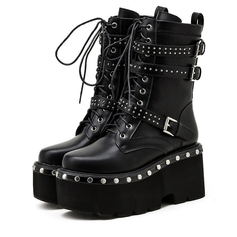 Ladies gothic ankle boots with chunky platform, lace-up design, and studded belts for a punk aesthetic.