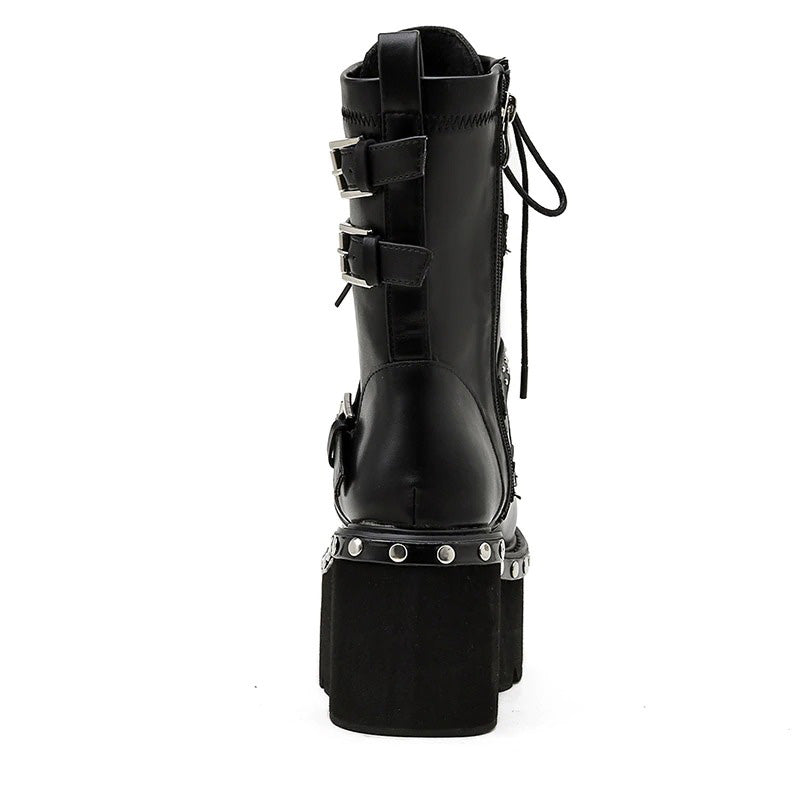 Back view of ladies gothic ankle boots with chunky platform, buckles, and elegant leather finish.