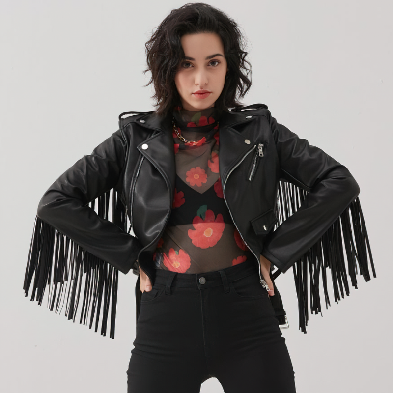 Stylish women wearing a black PU leather biker jacket with fringe, combining rock style and modern fashion.