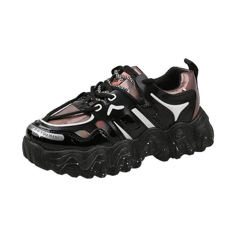 Ladies black lace-up sneakers with thick platform, glossy and matte finish, trendy mixed colors for casual wear.