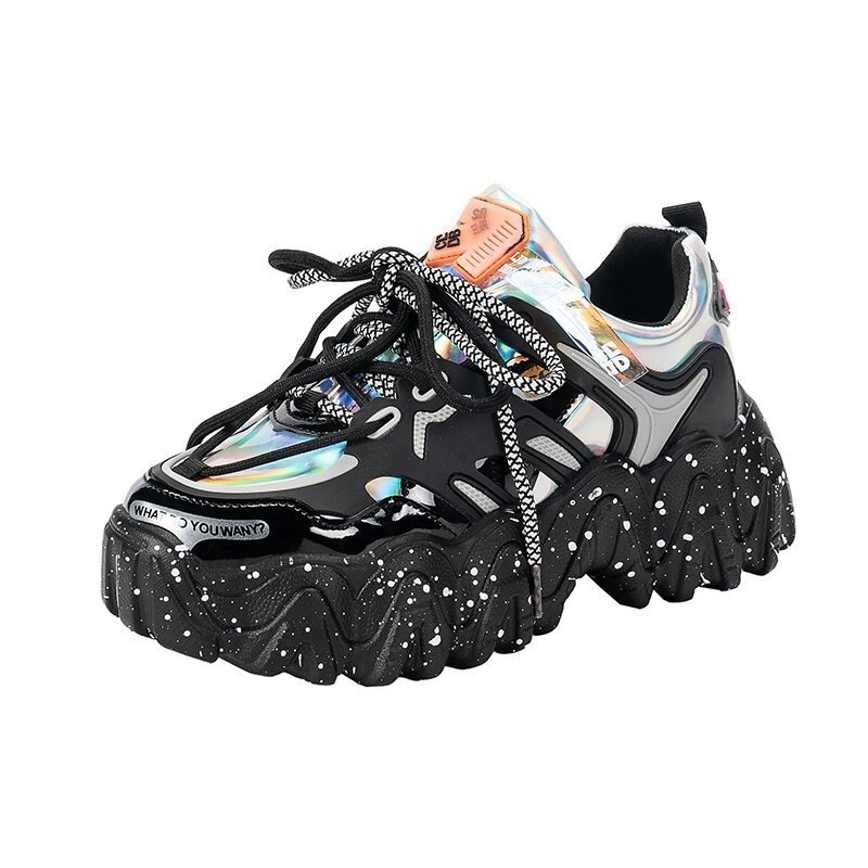 Ladies casual black lace-up sneakers with thick colorful outsole and shiny details for a trendy look.