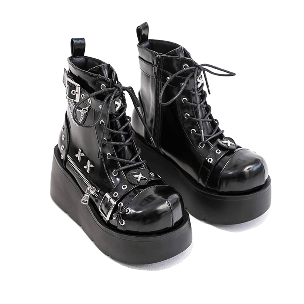Ladies Goth buckle platform ankle boots with zip and rivets, perfect for a punk fashion statement.