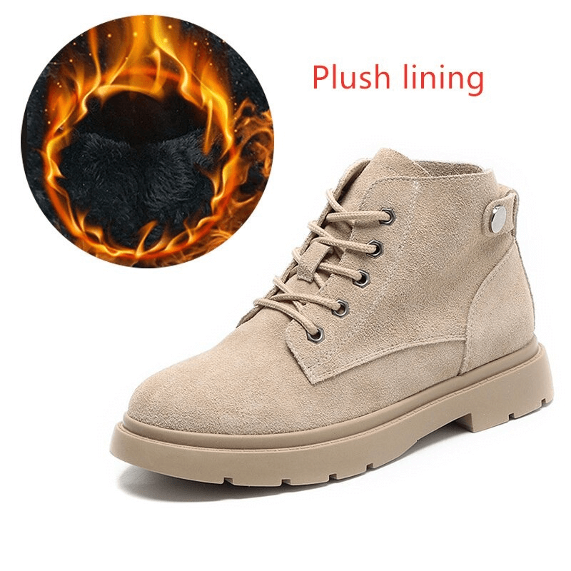 Stylish beige suede lace-up ankle boots with plush lining and platform soles, perfect for a trendy alternative footwear look.