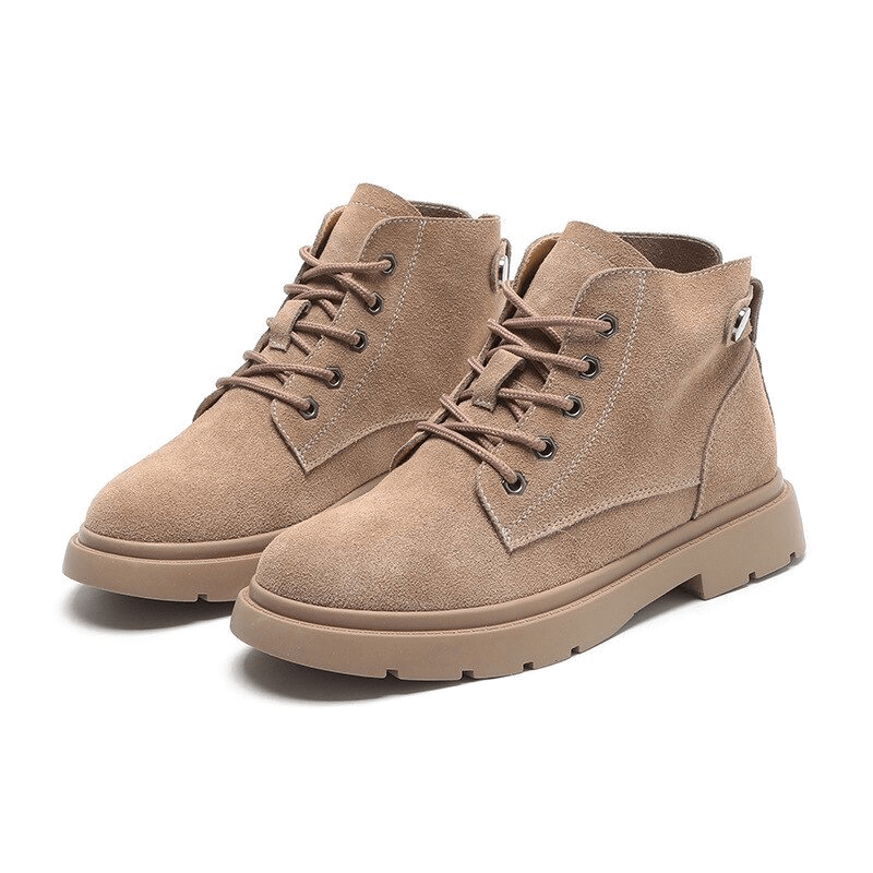 Stylish ladies lace-up fur suede ankle boots with platform soles in beige, perfect for alternative footwear lovers.