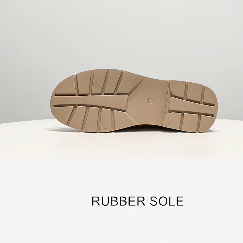 Bottom view of rubber sole showcasing grip and stability for stylish ankle boots.