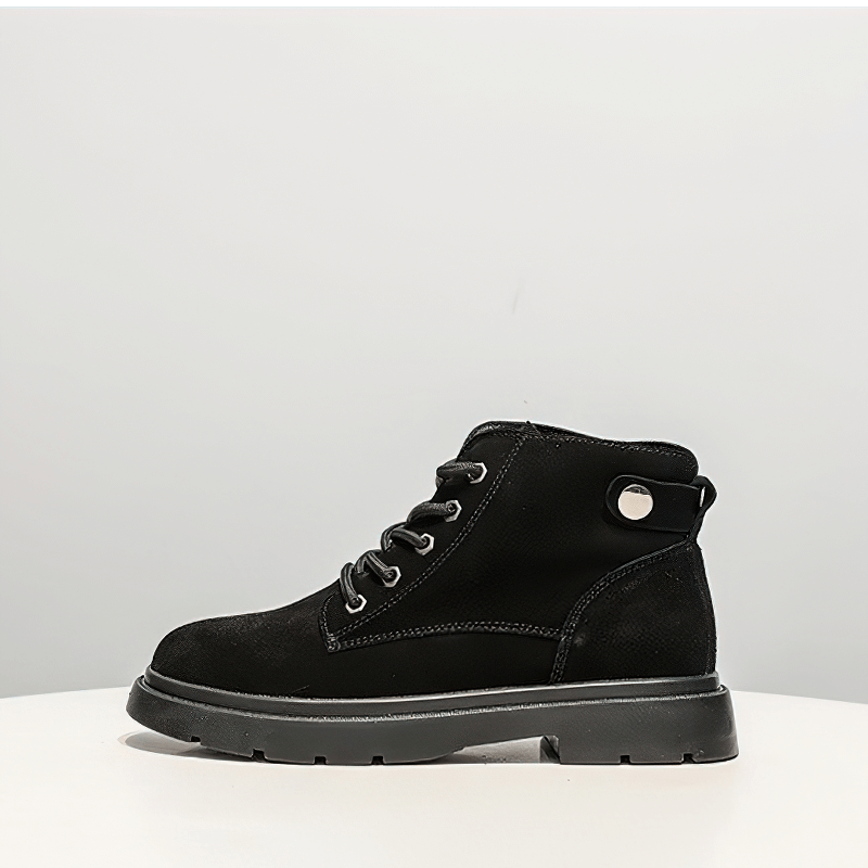 Ladies black suede lace-up ankle boots with platform soles, stylish alternative footwear for trendy looks.