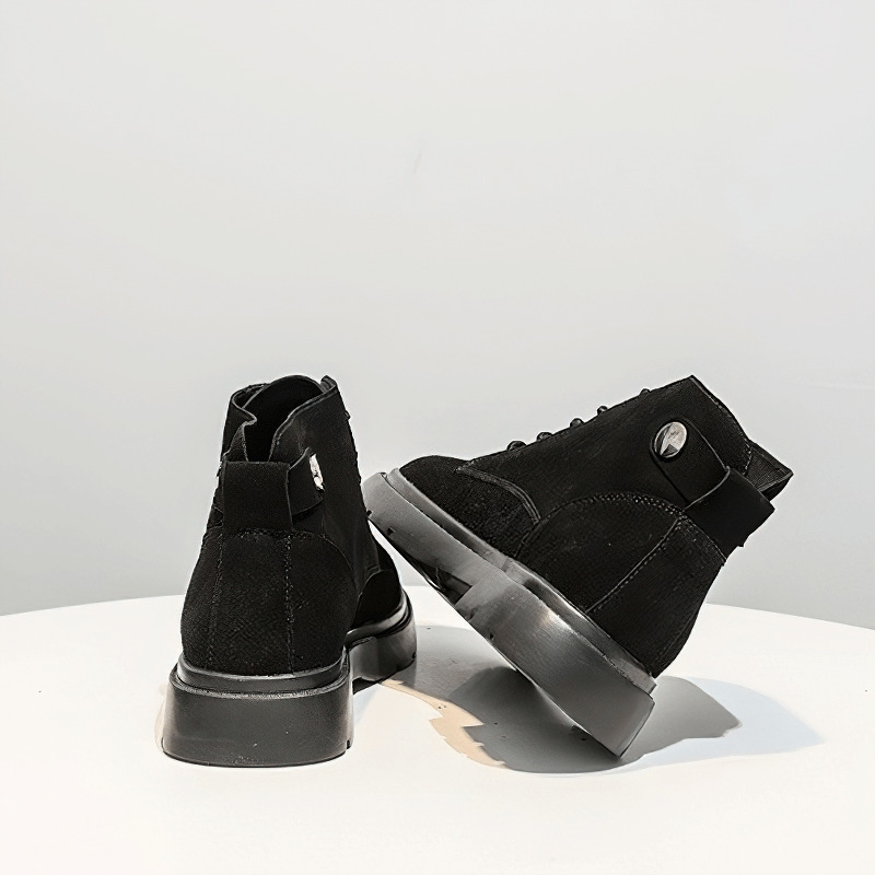 Stylish black suede platform ankle boots with lace-up design, perfect alternative footwear for women.