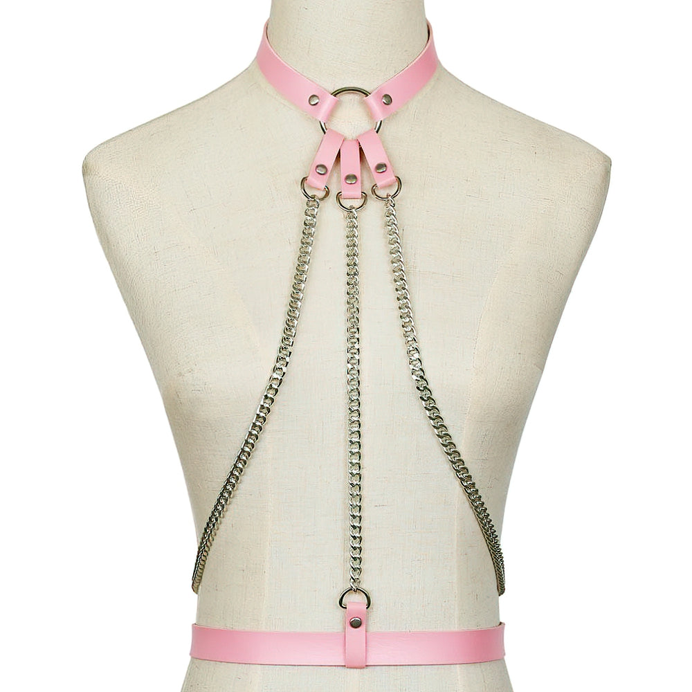 Stylish pink leather body harness with chains, perfect for alternative fashion and daring looks.