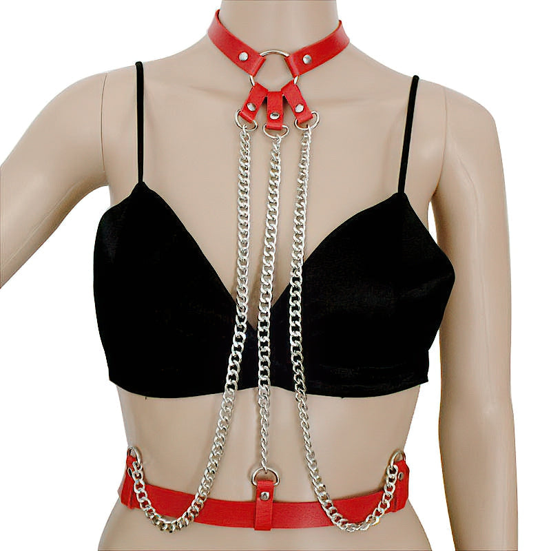 Ladies leather straps body suspenders with chains, edgy harness accessory for bold fashion statements.