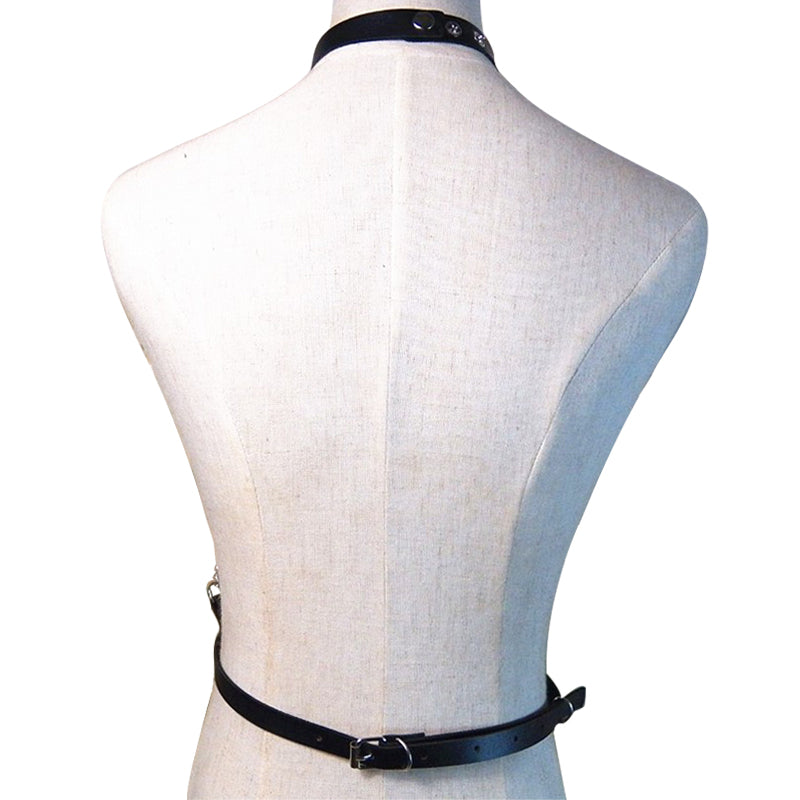 Back view of ladies leather straps body suspenders with chains, an edgy alternative style harness accessory.