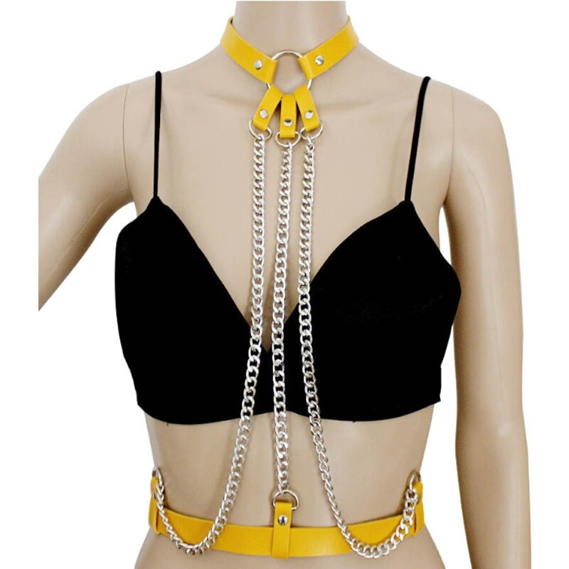 Ladies leather body suspenders with chains, featuring yellow straps and an edgy, alternative style.